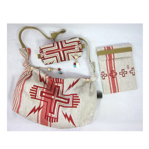 Tinder hobo, Flare iPad slip case and Squall zip pouch all in Navajo red.